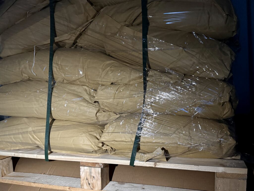 Bagged product on a pallet, wrapped for shipment